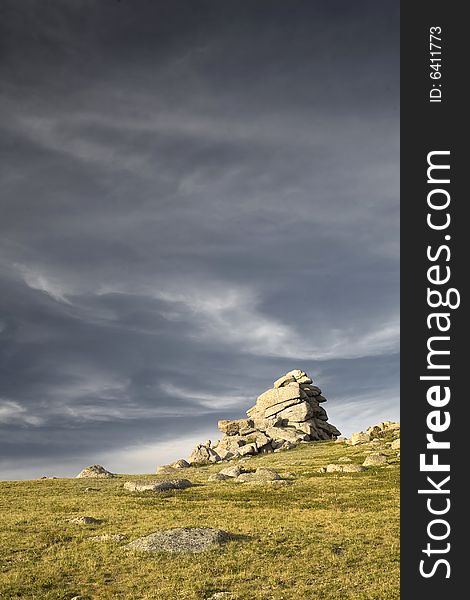 High mountain's rocks, summer, sky and clouds. High mountain's rocks, summer, sky and clouds