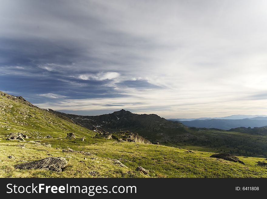 High mountain's summer view, Altai, blue sky, white clouds, lot of sun