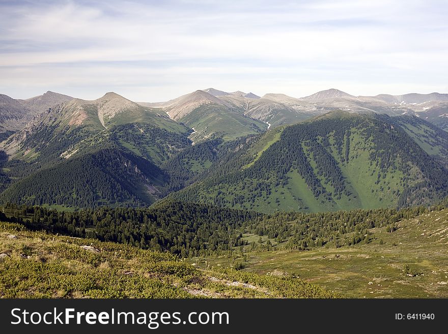 High mountain's summer view, Altai, blue sky, white clouds, lot of sun