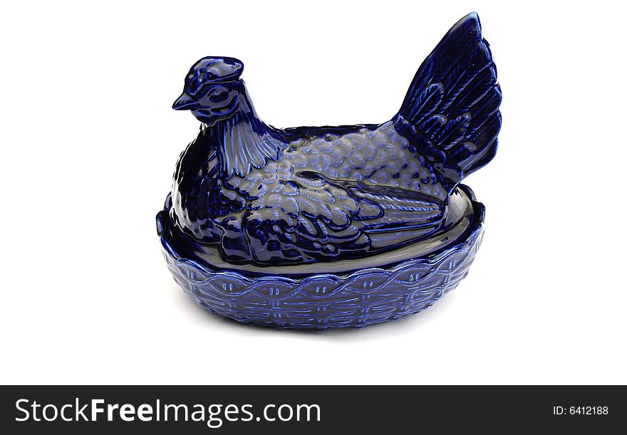 Shot of a blue china hen on white