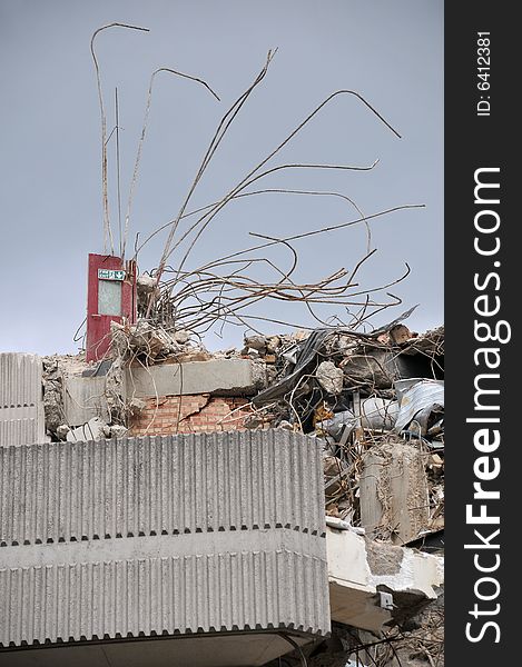 Demolished building showing fire exit remains and reinforced concrete structure. Demolished building showing fire exit remains and reinforced concrete structure.