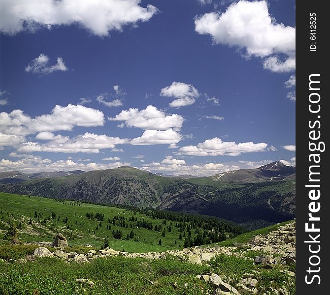 High mountain's summer view, Altai, blue sky, white clouds, lot of sun