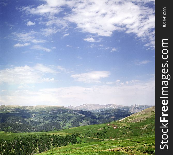 High mountain's summer view, Altai, blue sky, white clouds, lot of sun