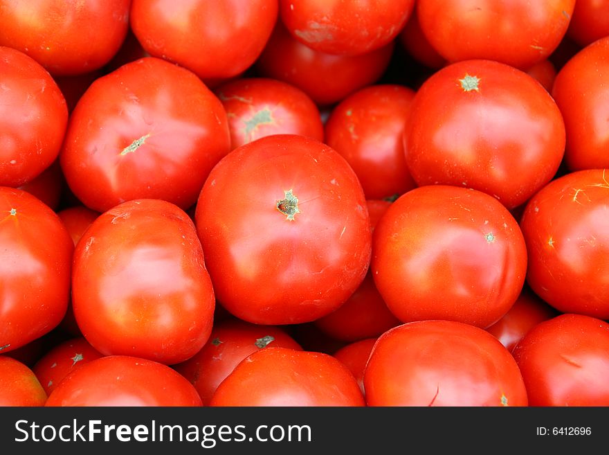 Fresh tomato from the garden, ideal for backgrounds. Fresh tomato from the garden, ideal for backgrounds