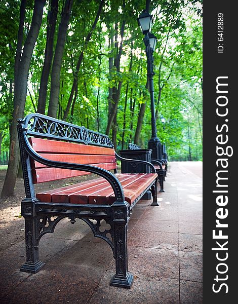 Old-fashioned bench in city park