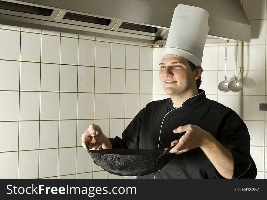 Chef Holding A Wok