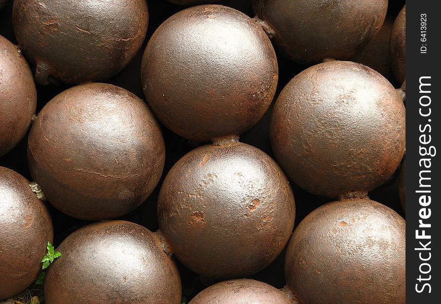 Art made of rusty cannonballs