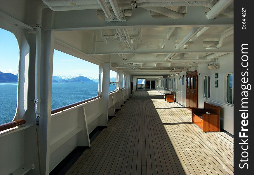 Alaskan landscape through windows of cruise liners' deck. Alaskan landscape through windows of cruise liners' deck.