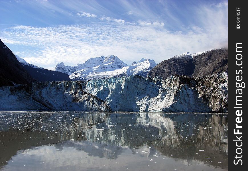 The view of Alaskan glacier with reflections. The view of Alaskan glacier with reflections.