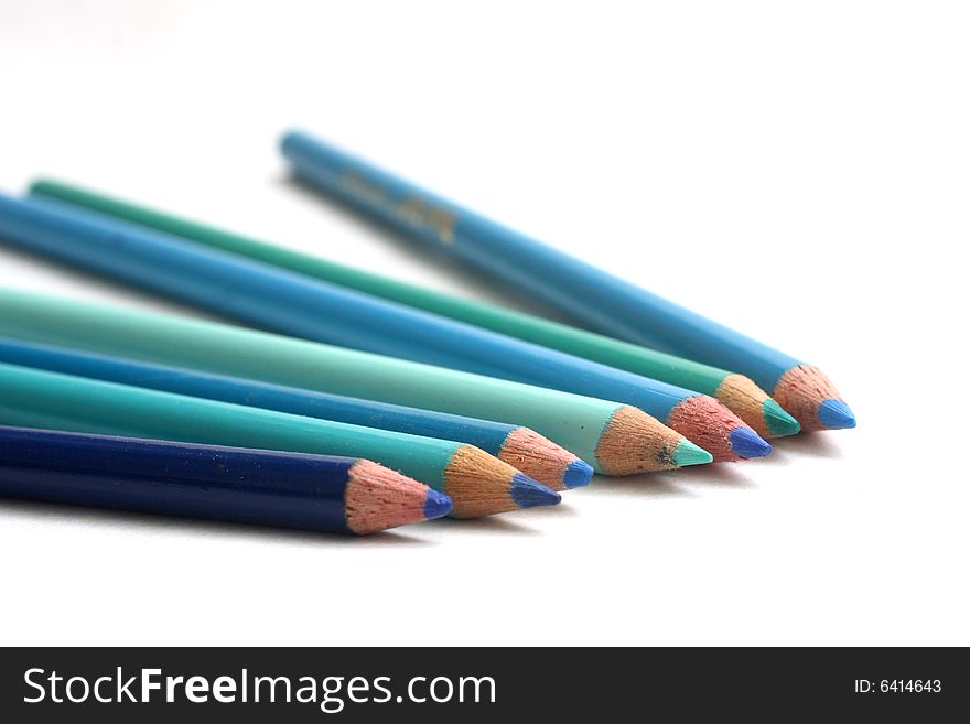 Coloring pencils of blue hues on white background. Coloring pencils of blue hues on white background