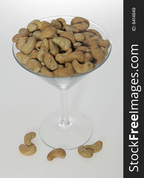 Cashews in a martini glass, from above. Cashews in a martini glass, from above
