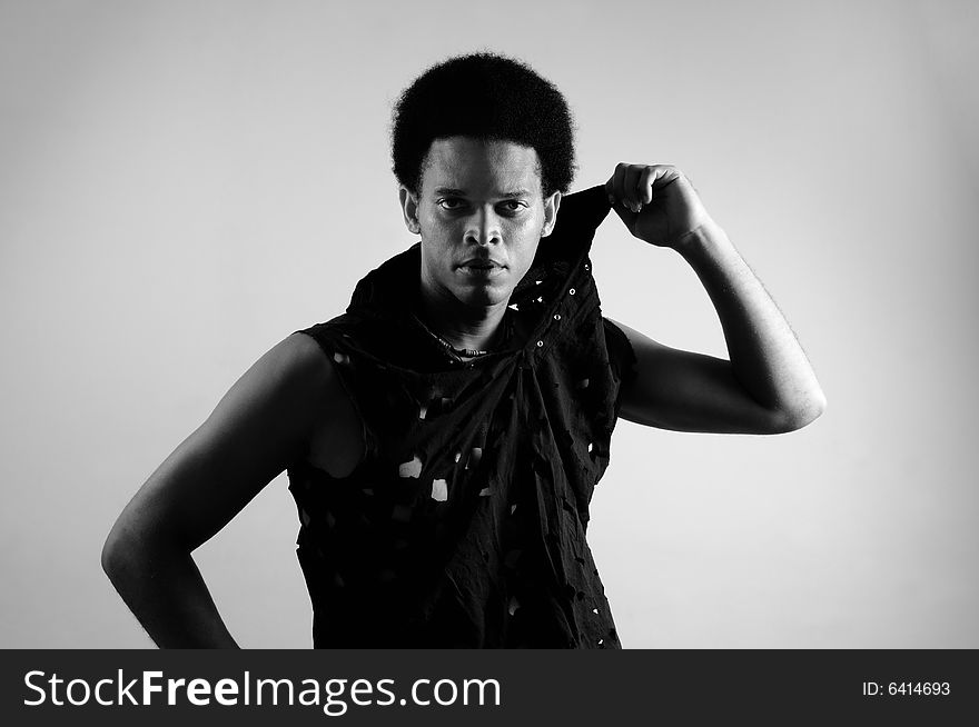 Black and white portrait of young trendy african man posing - isolated. Black and white portrait of young trendy african man posing - isolated