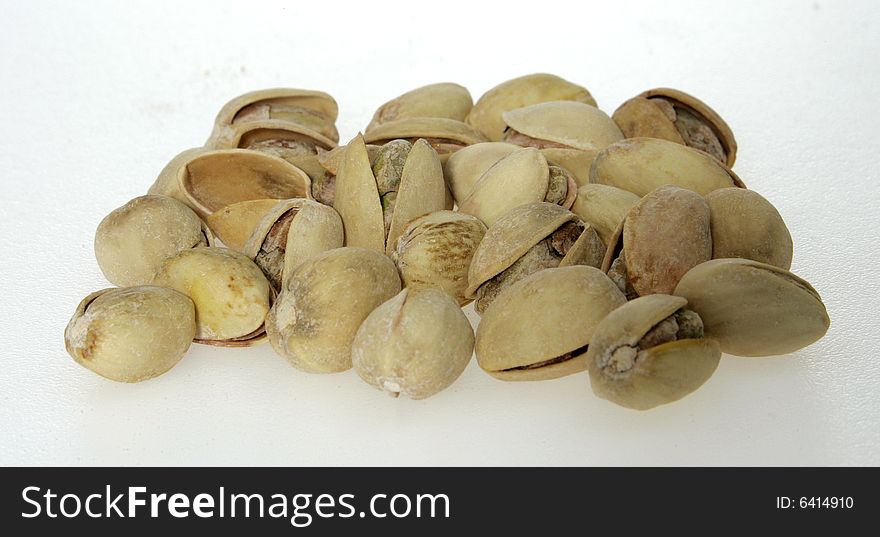 Pistachios, in their shell, on a table