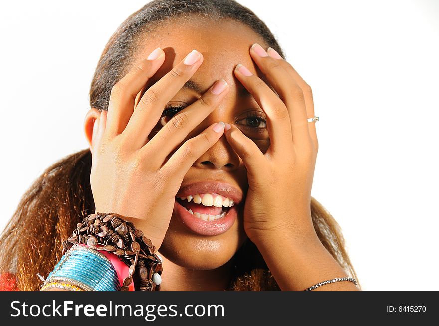 African teen girl with hands on the face - isolated. African teen girl with hands on the face - isolated