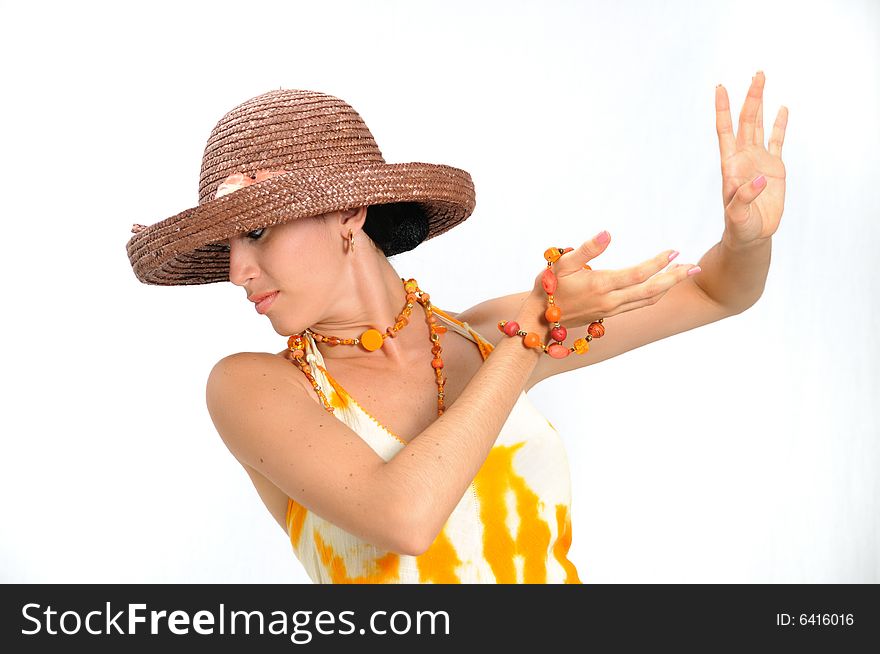 Portrait of young fashion woman posing with hat - isolated. Portrait of young fashion woman posing with hat - isolated