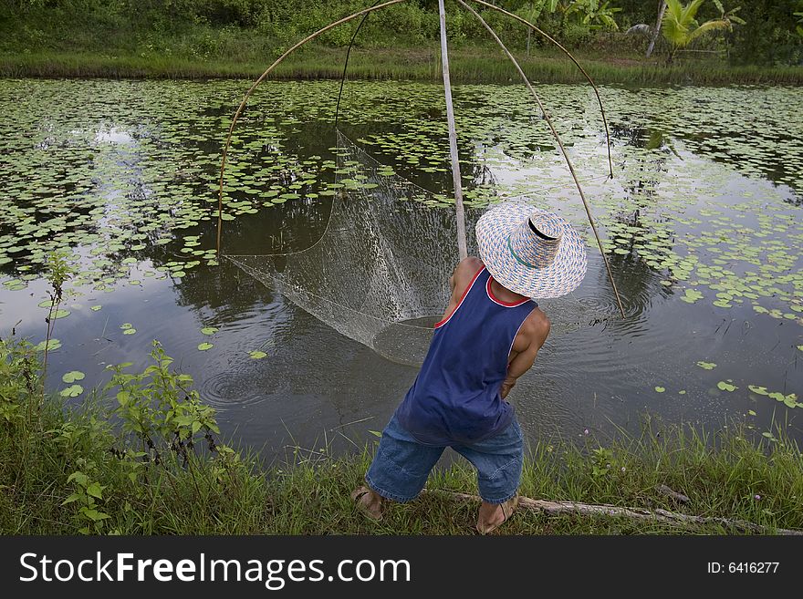 Fisherman with stave, Asia