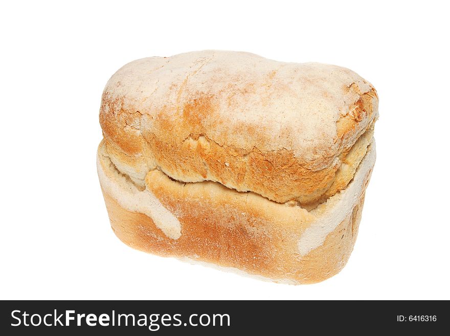Freshly baked crusty farmhouse loaf of bread on white. Freshly baked crusty farmhouse loaf of bread on white