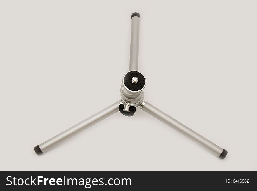 Small tripod isolated on white