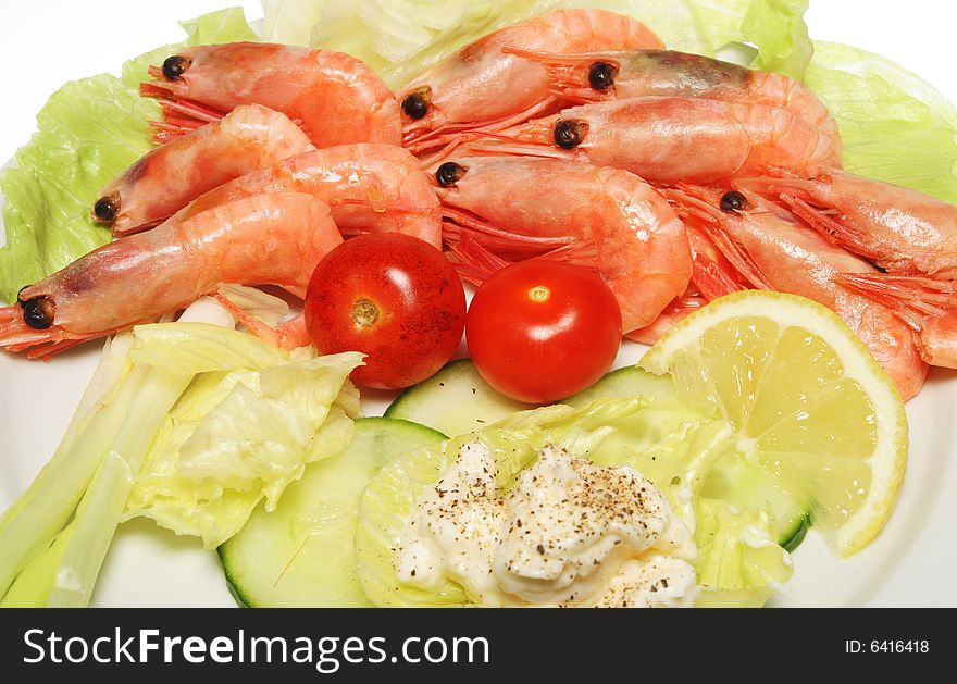 Prawn salad closeup on white plate