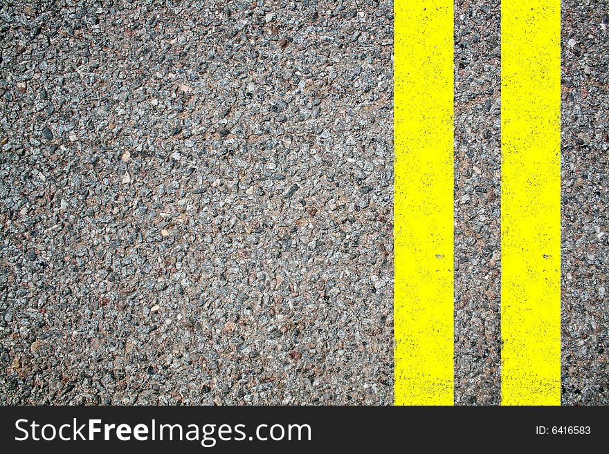 Road asphalt with yellow lines