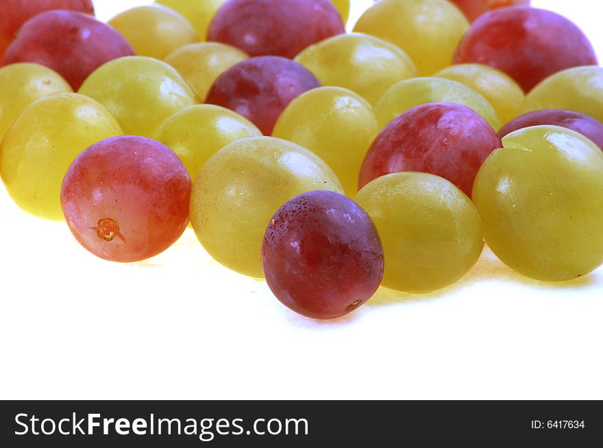 Bunch of fresh grapes with leaf isolated on white