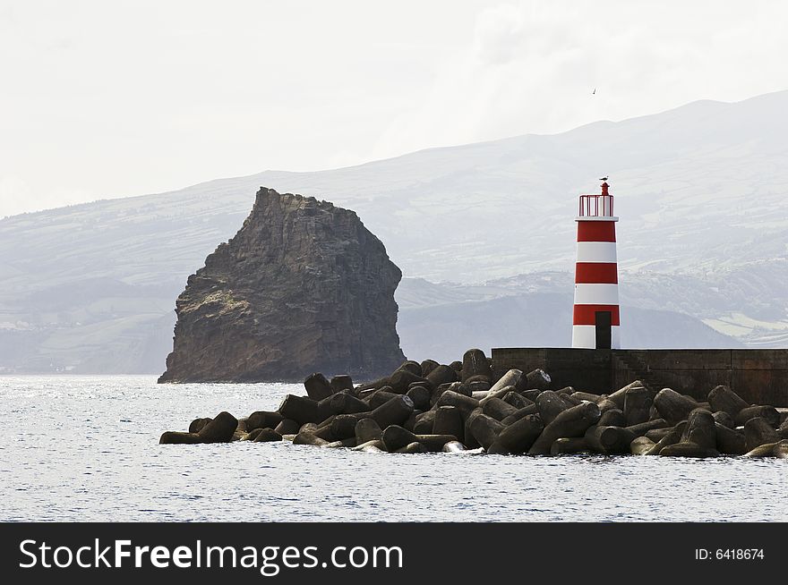 Tip of the jetty of Madalena harbor in Pico island