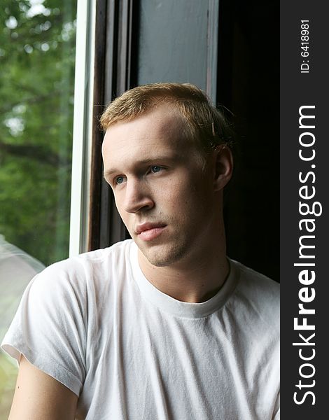 Natural Light Man With Thinning Hair At Window