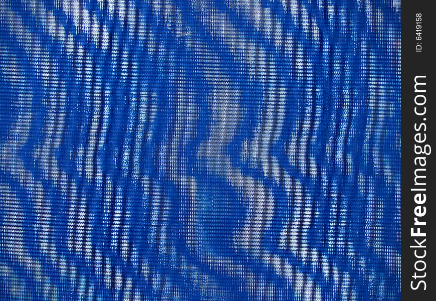 Fabric mesh background swirling with cobalt and cyan light and dark areas.  Can be used horizontally or vertically. Fabric mesh background swirling with cobalt and cyan light and dark areas.  Can be used horizontally or vertically.