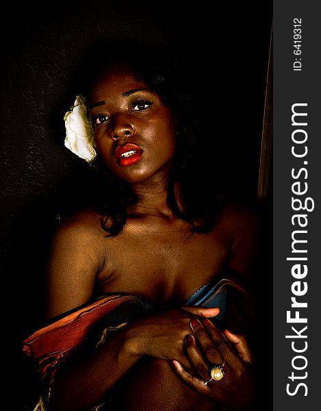 A young african american girl, photographed in the studio.