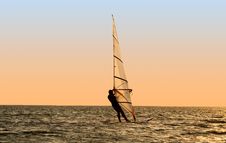 Silhouette Of A Windsurfer On Waves Stock Photography