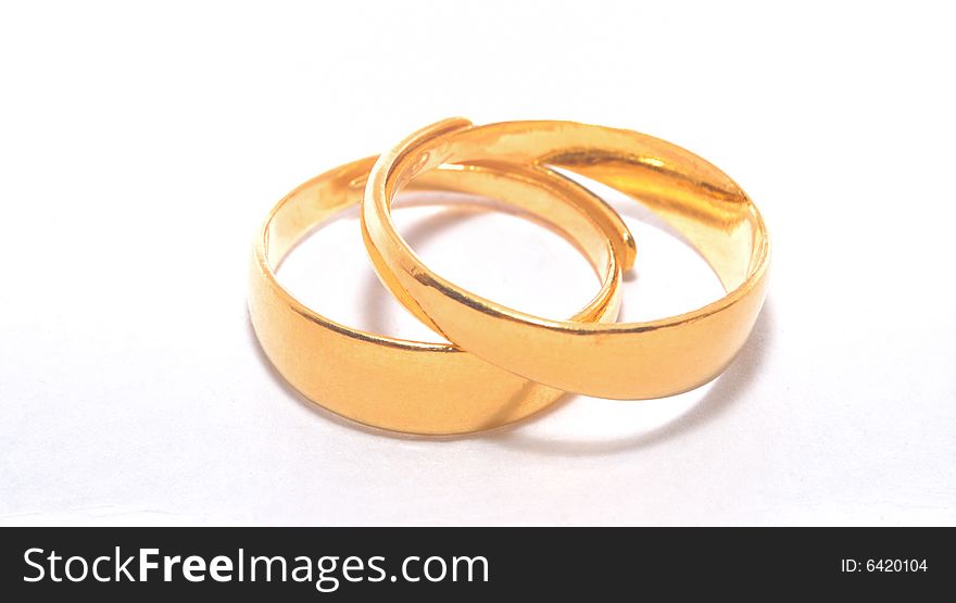 It is 2 gold finger rings.