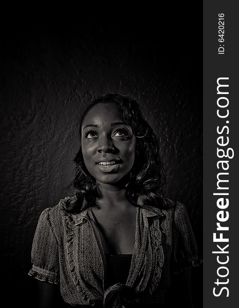 A young african american girl, photographed in the studio.