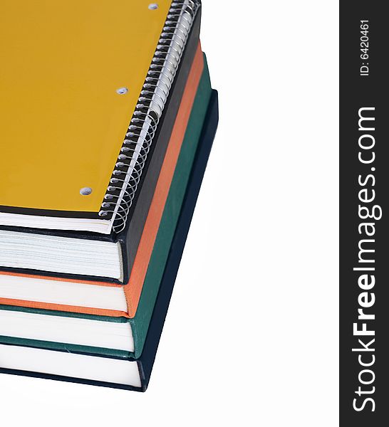 Pad and text books books set against white background. Pad and text books books set against white background