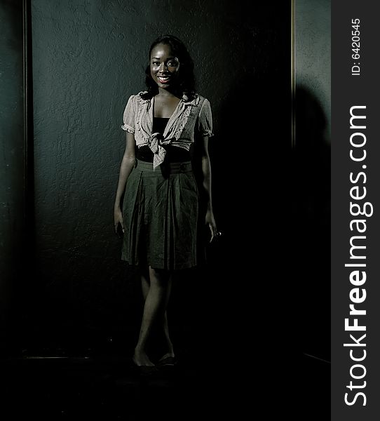 A young african american girl, photographed in the studio.