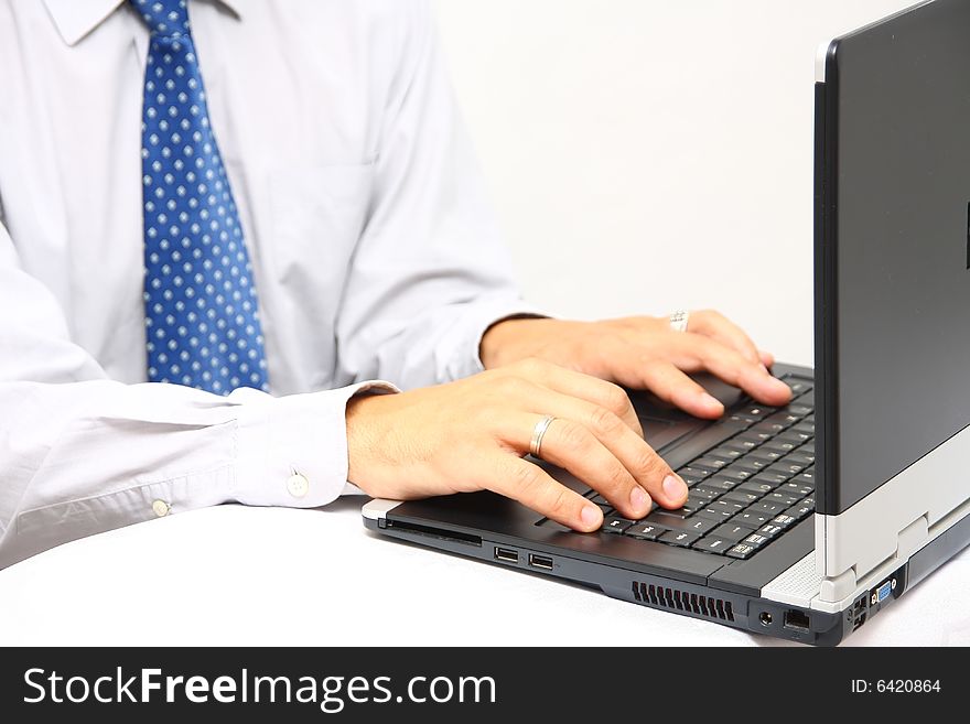 Usinessman working at his desk. Usinessman working at his desk.