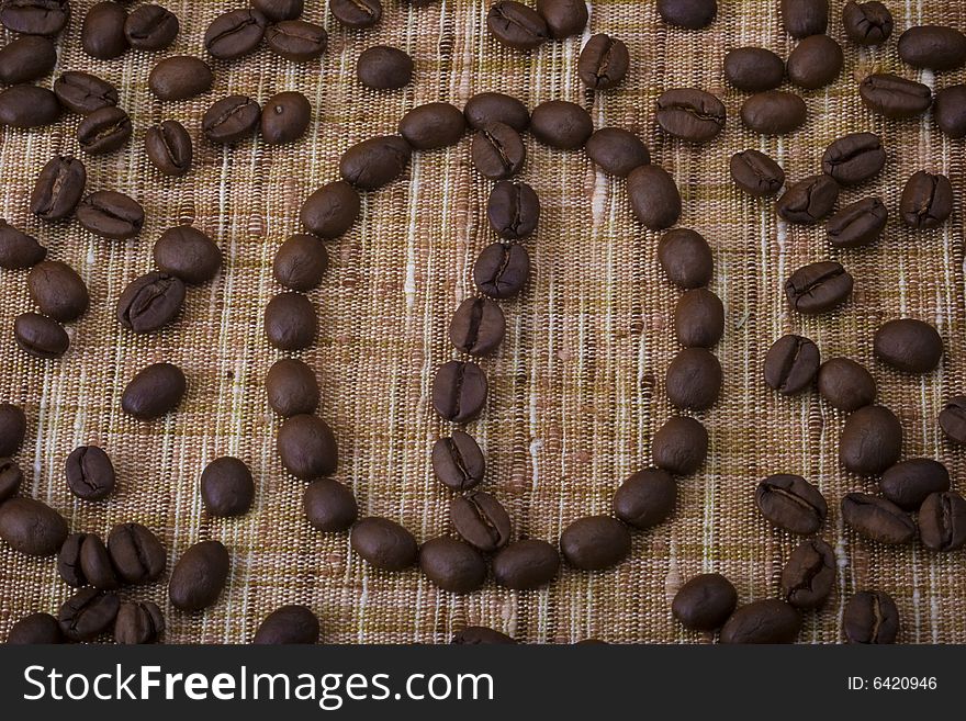 Coffee beans on brown sacking