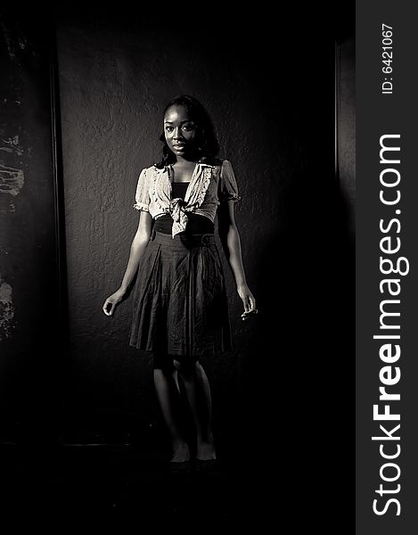 A young african american girl, photographed in the studio.