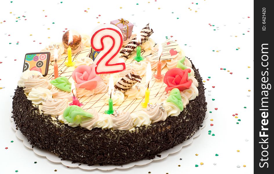 Cake with candle on white background