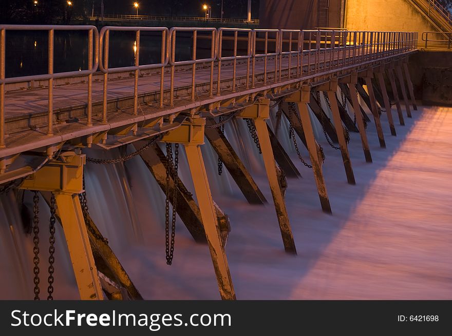Water flowing through a barrage in the river Maas, The Netherlands. Water flowing through a barrage in the river Maas, The Netherlands