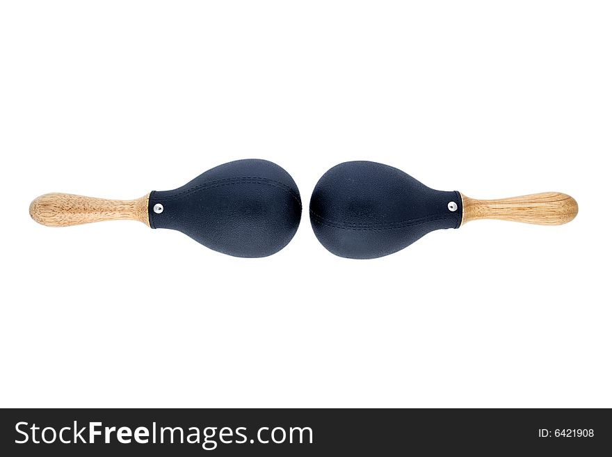 Pair of black plastic maracas isolated on white with wooden handles