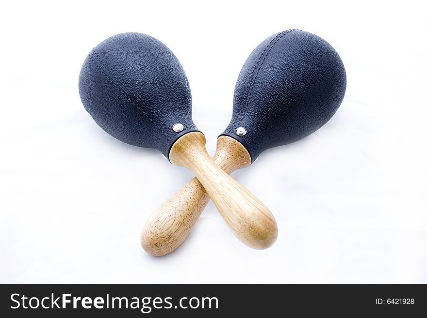 Pair of black plastic maracas isolated on white