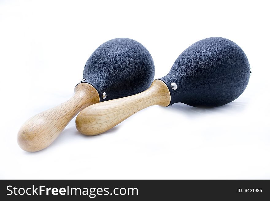 Pair of black plastic maracas isolated on white