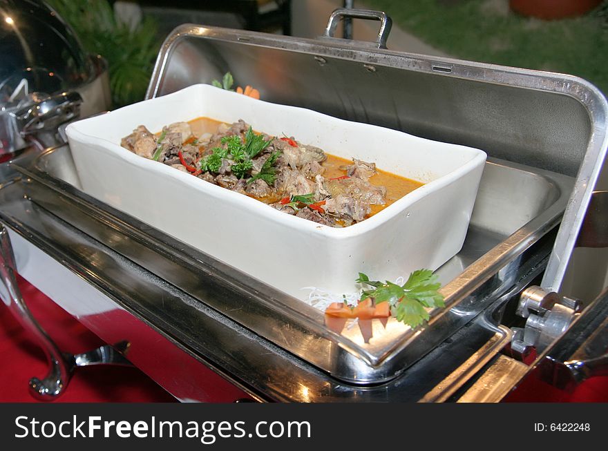 Chicken curry food in chafing dish