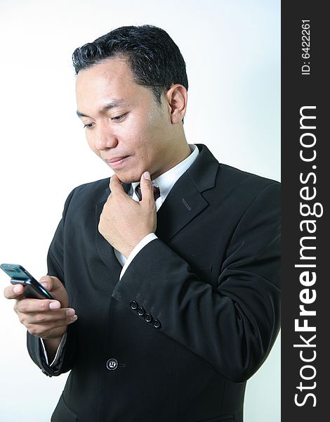 Business Man With Mobile Device