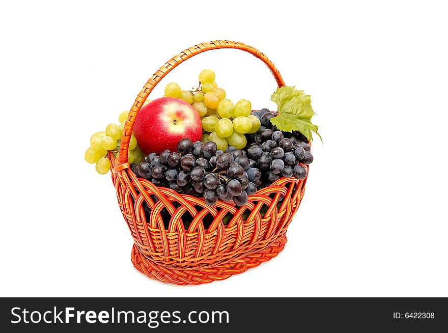 Bunches Of Grapes And Apples In Basket.