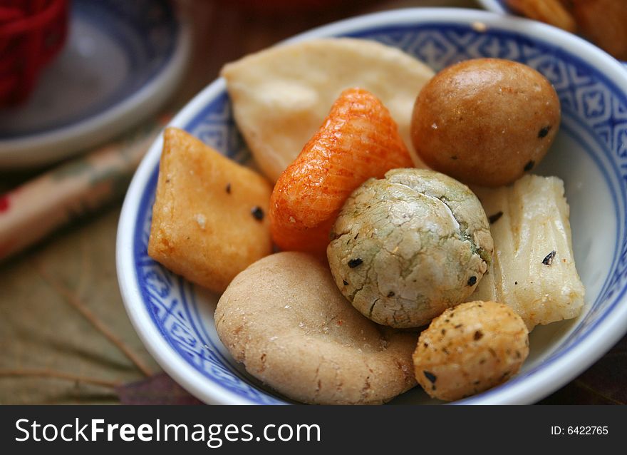 Some asian rice cockies in chinese table-ware