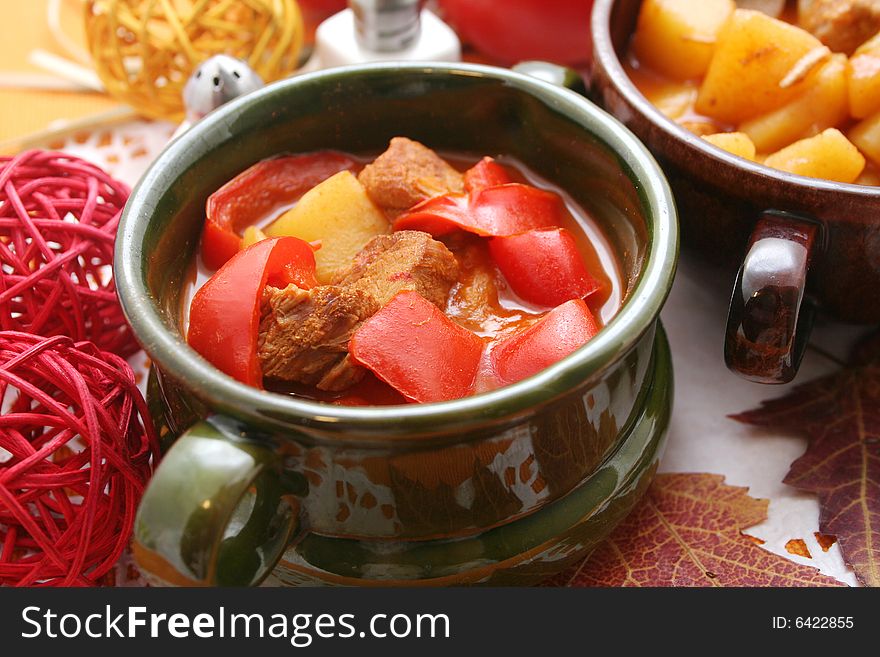 A fresh stew of meat and red and yellow paprikas. A fresh stew of meat and red and yellow paprikas