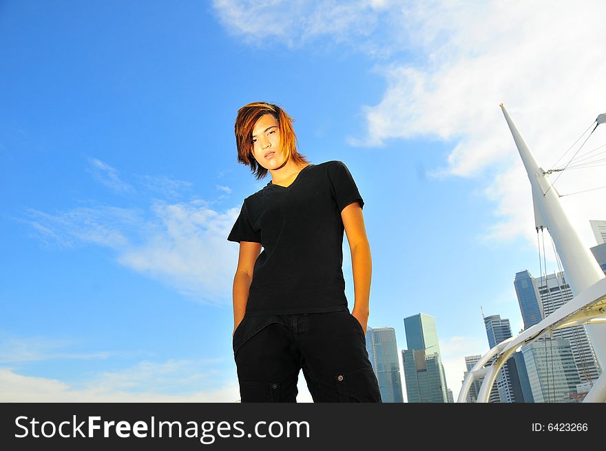 Picture of a long hair youth, rebellious and ready to rock. Useful for illustrating youths in society and Generation Z. Picture of a long hair youth, rebellious and ready to rock. Useful for illustrating youths in society and Generation Z.