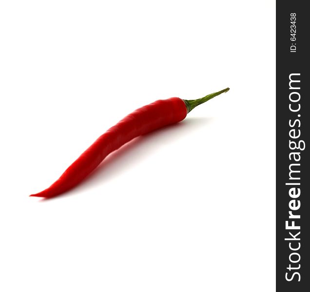 A chili pepper isolated on a white background. A chili pepper isolated on a white background