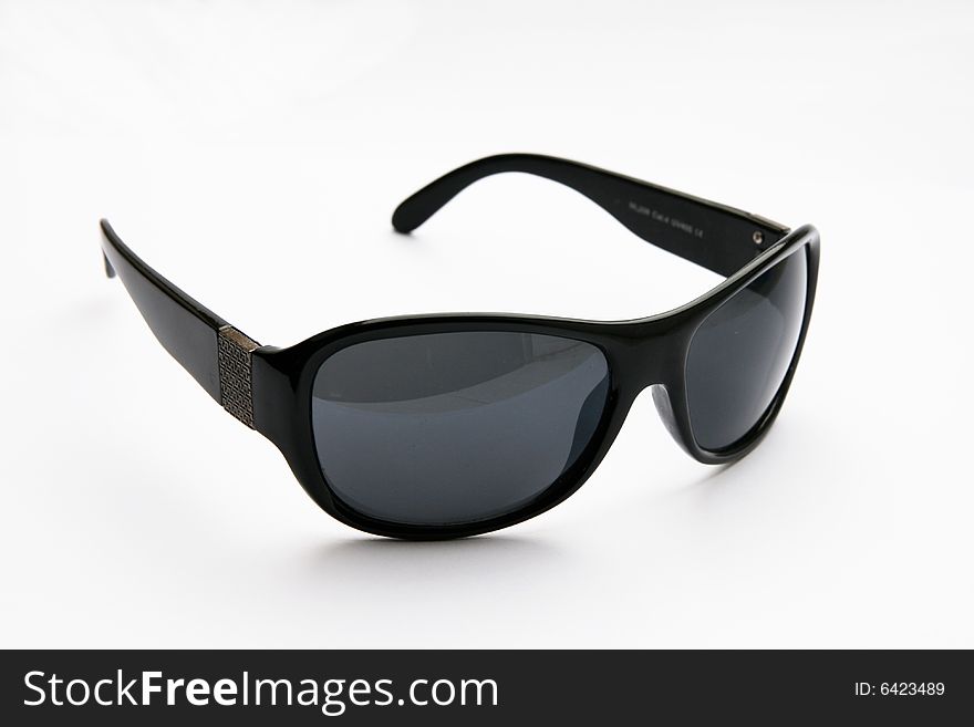 Black sunglasses isolated on white.